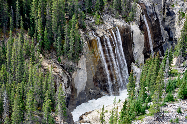 A waterfall and the river, far below